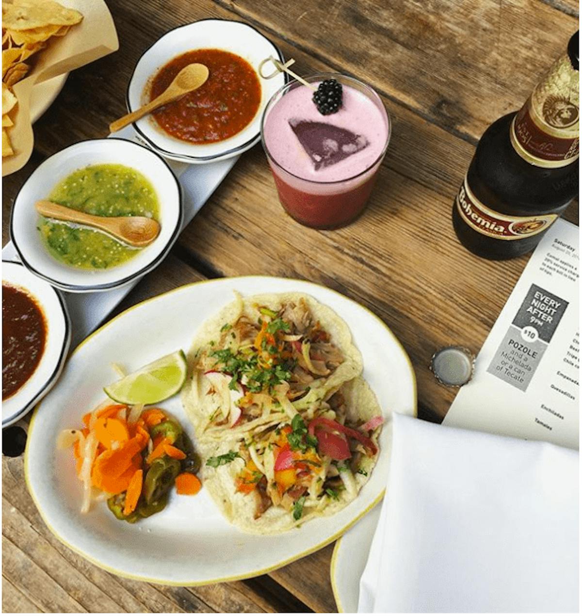a table topped with plates of food on a plate