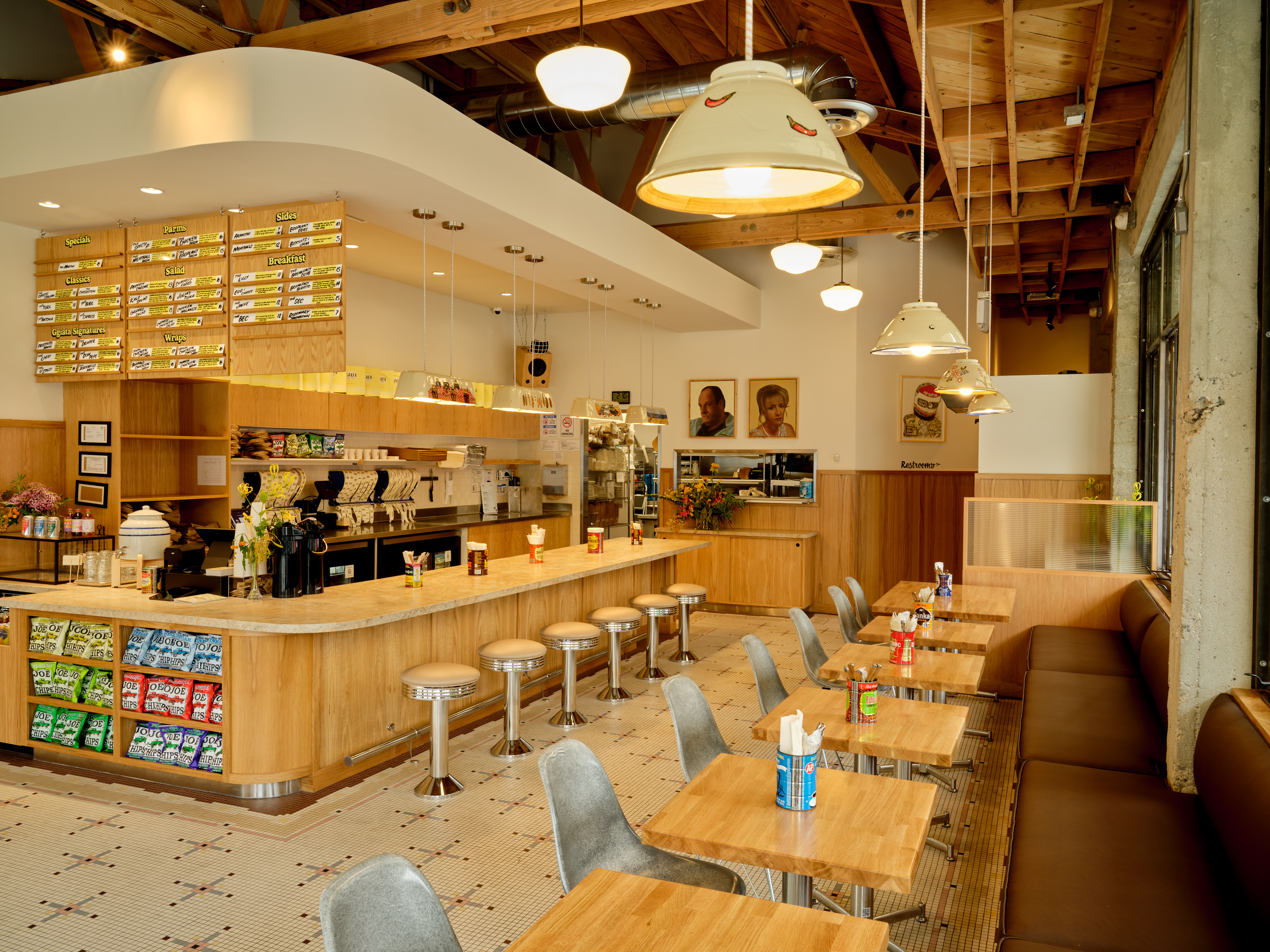 a restaurant with tables and chairs