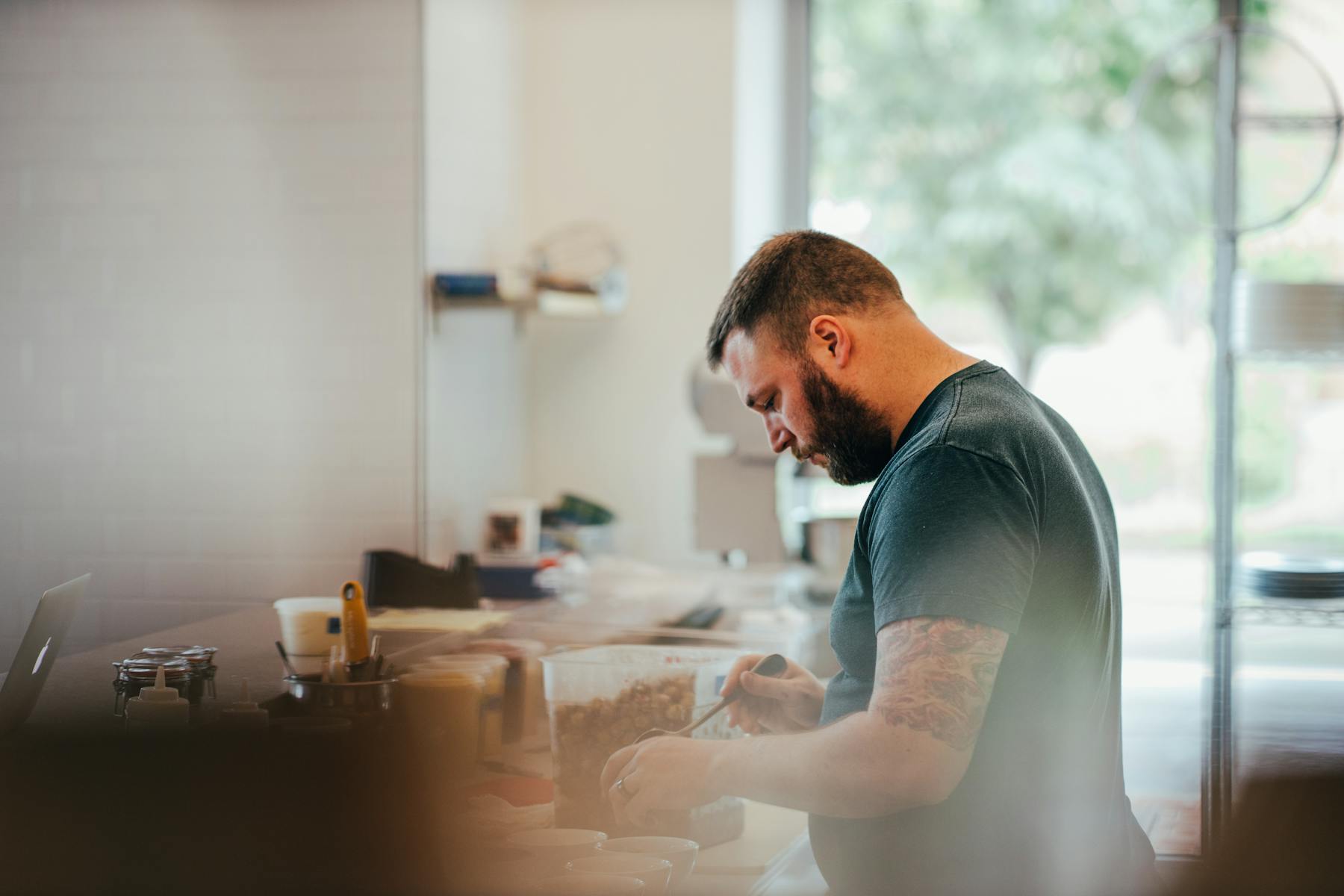 a man preparing food in a kitchen