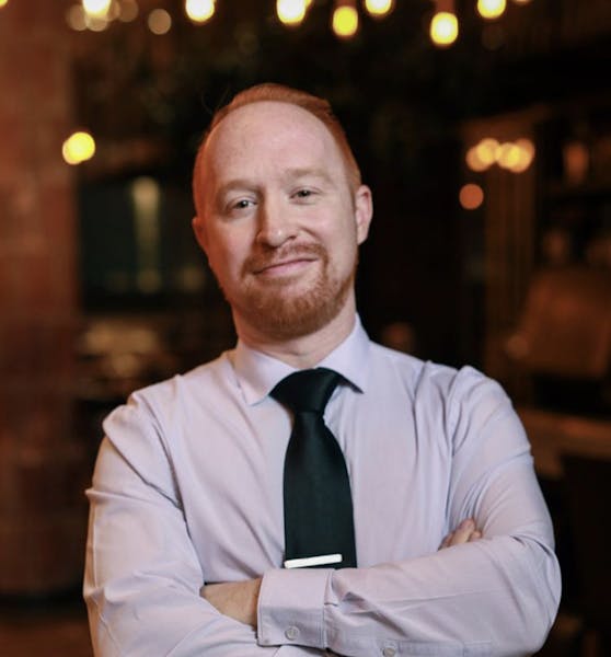 a man wearing a suit and tie
