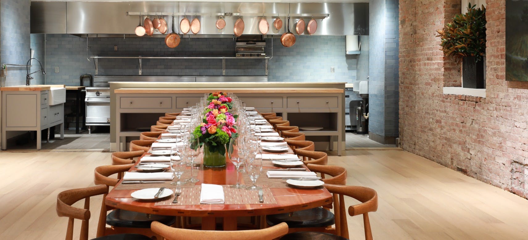a kitchen with a dining table
