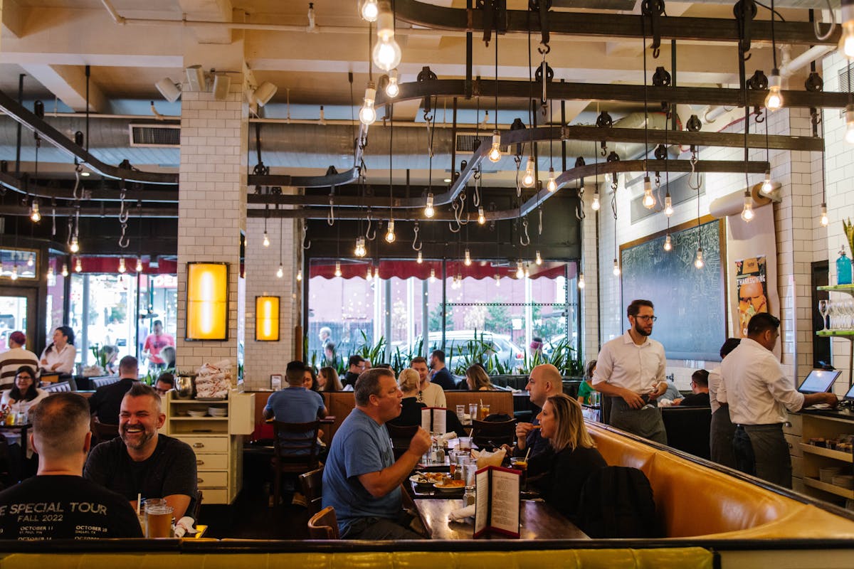 a dining area full of people