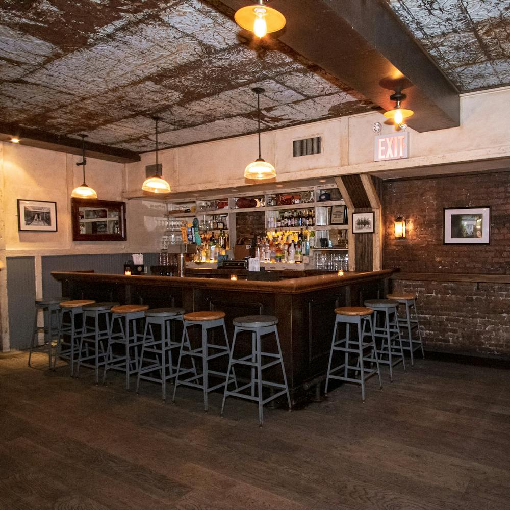 a group of people sitting at a train station