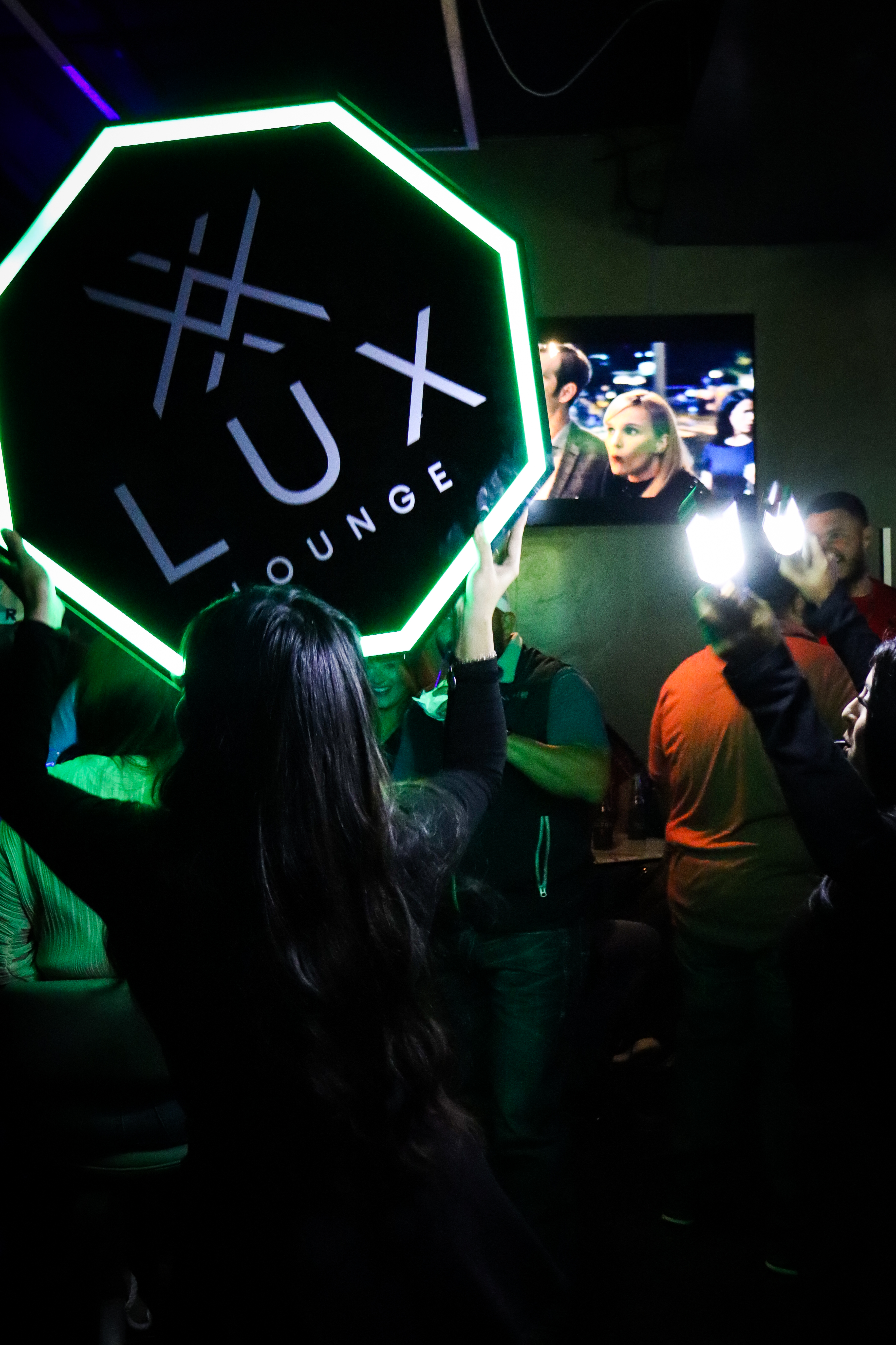 a group of people in a dark room