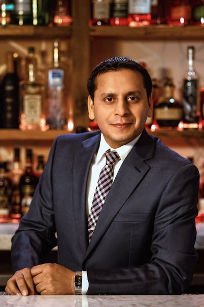 a man wearing a suit and tie