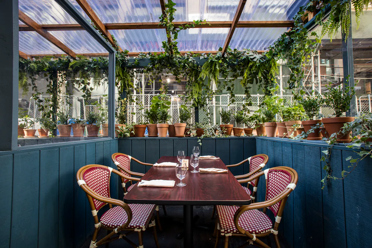a dining room table in front of a building