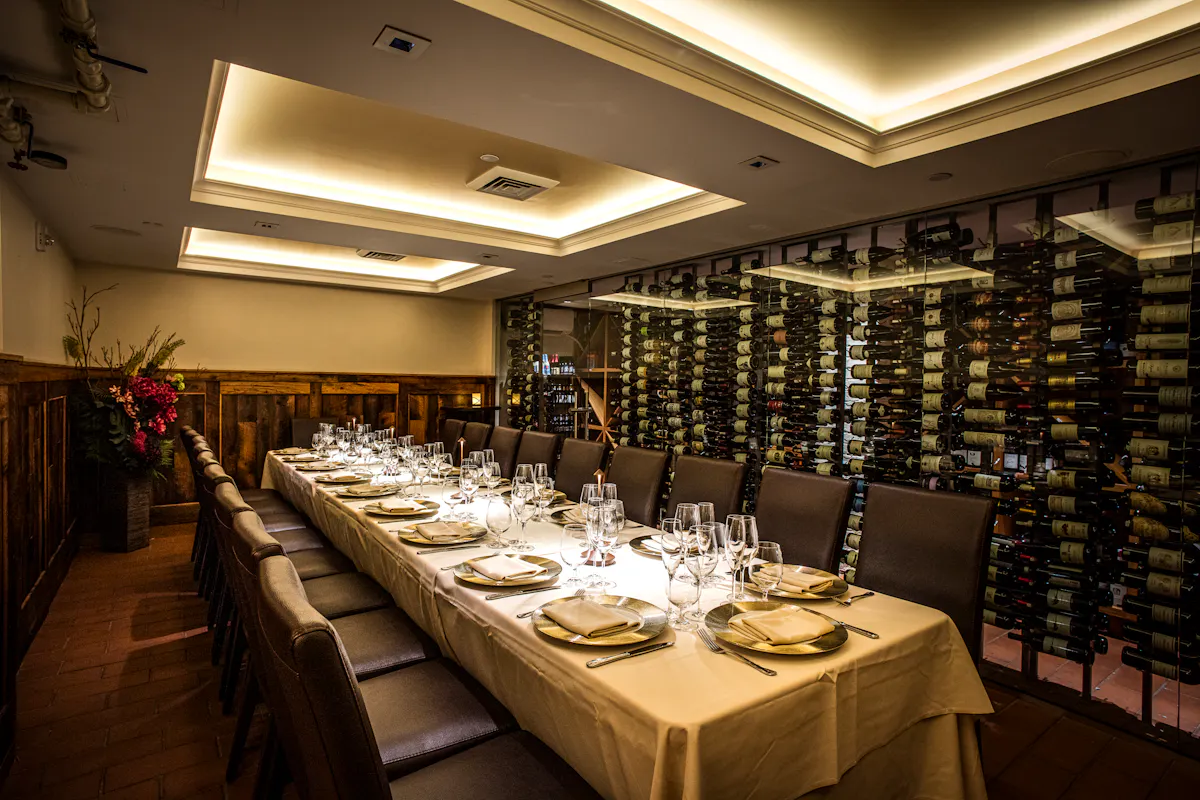 a room filled with furniture and vase on a table