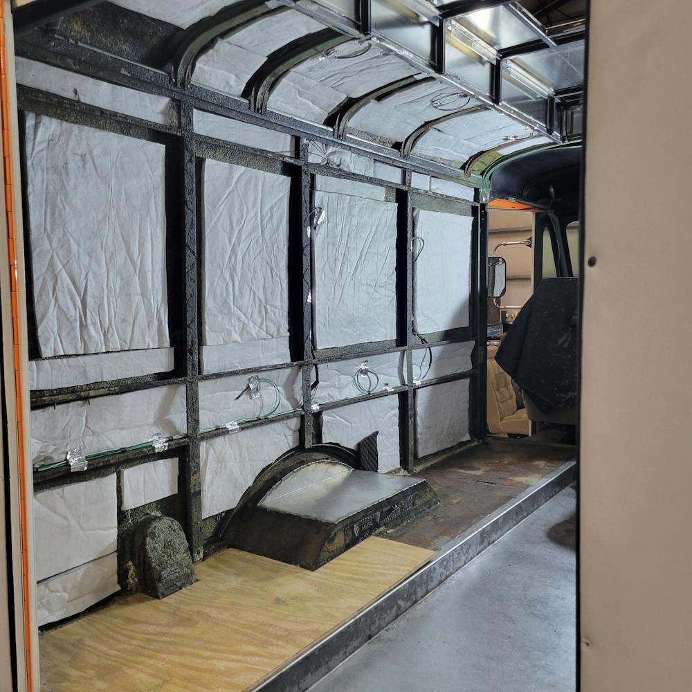 a chair sitting in front of a window