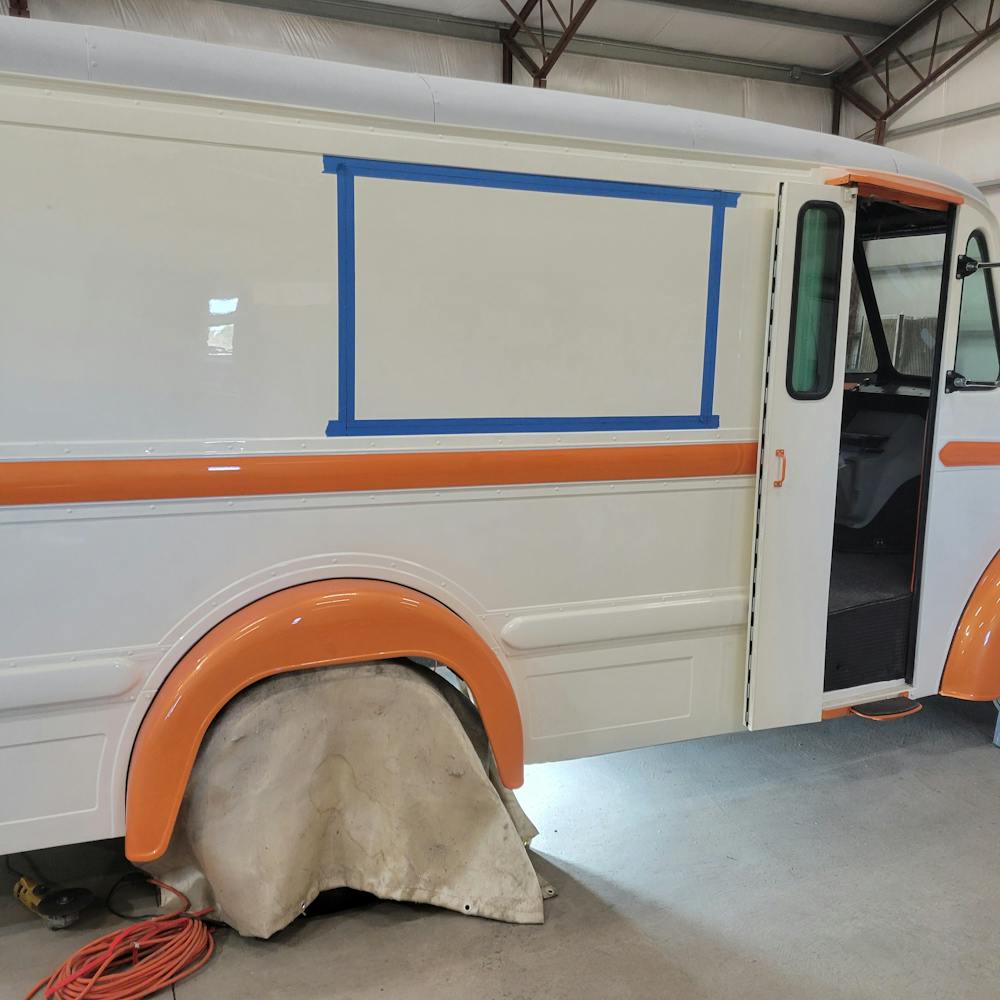 a chair sitting in front of a window