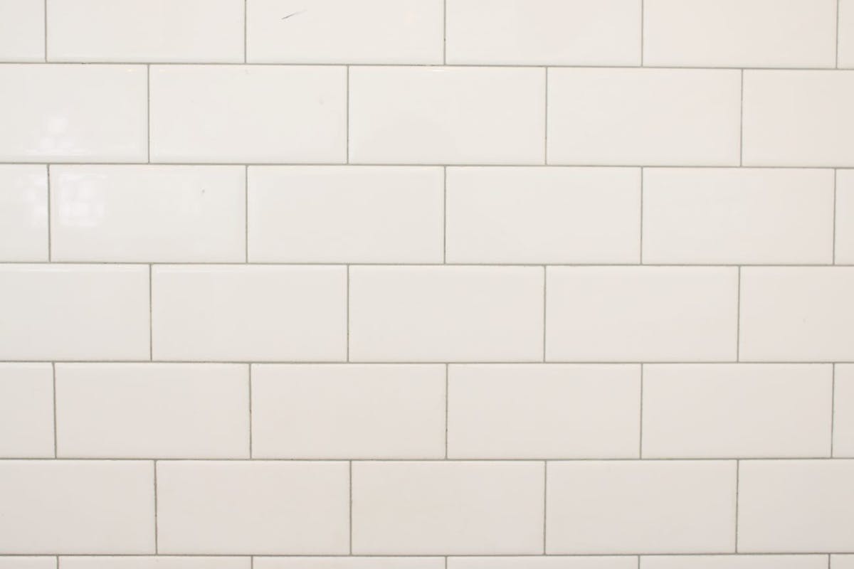 a close up of a tiled wall