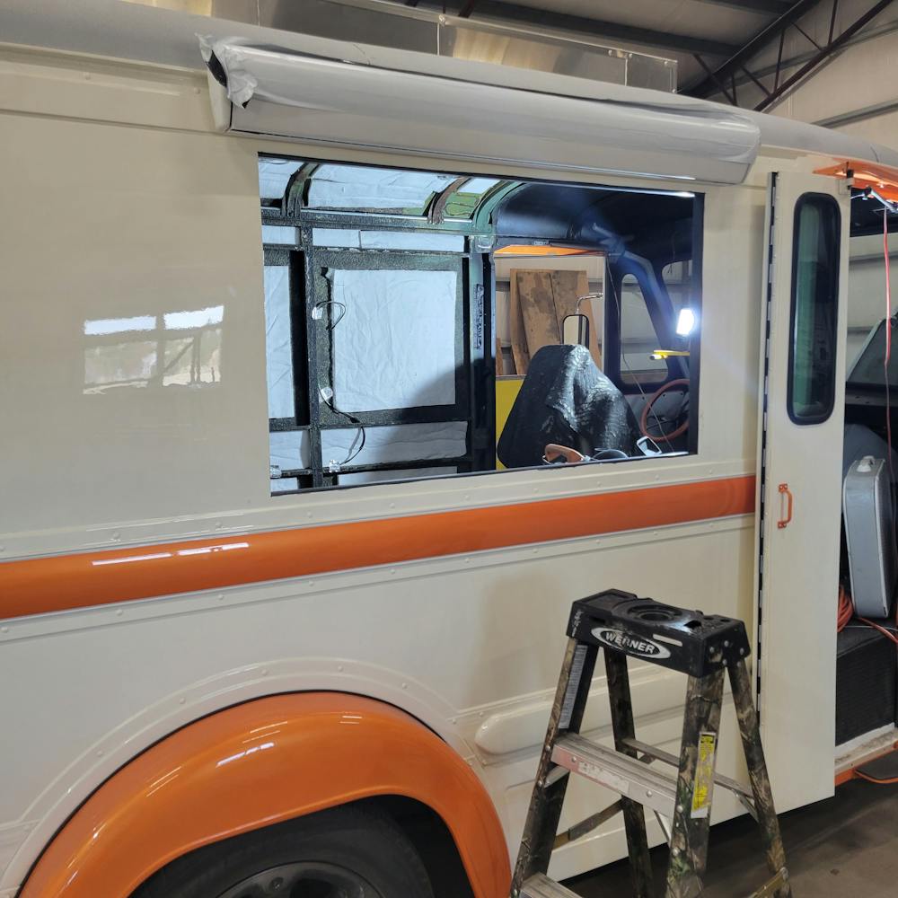 a chair sitting in front of a window