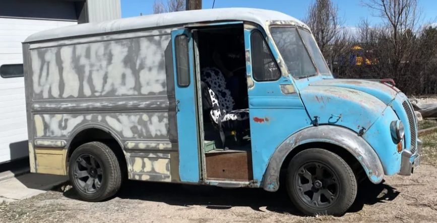 a van parked on the side of a road