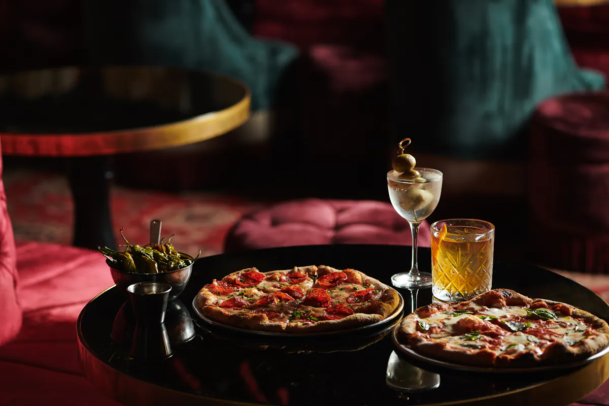 a pizza sitting on top of a table