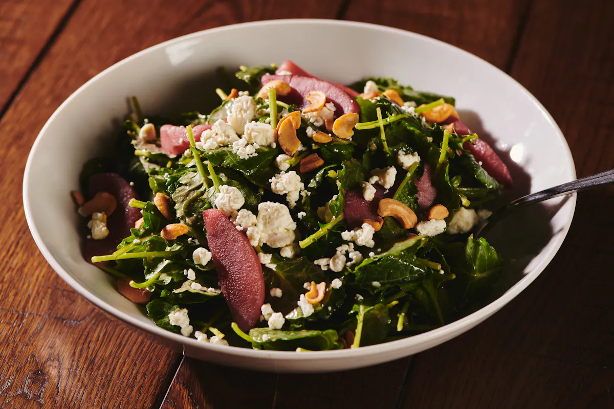 a bowl of salad on a plate