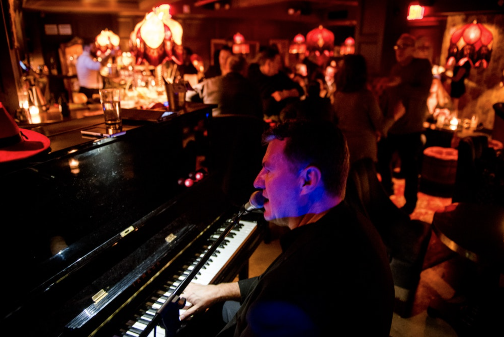 BoPeep singer with crowd in speakeasy