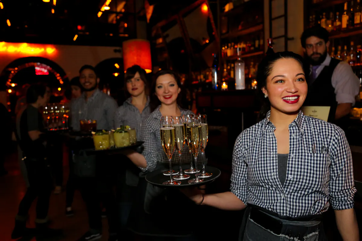 people holding drinks