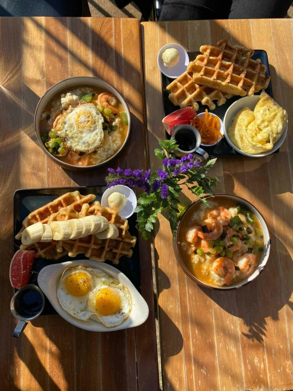 a bunch of food sitting on top of a wooden table