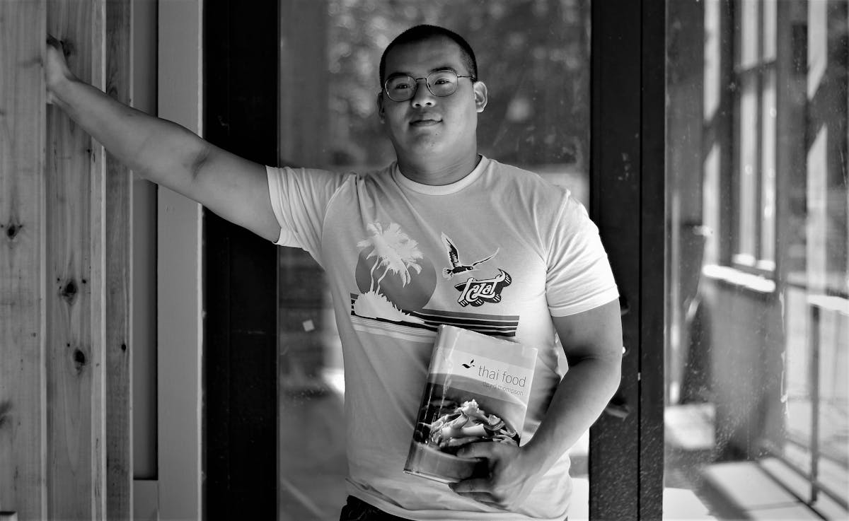 a man standing in front of a building
