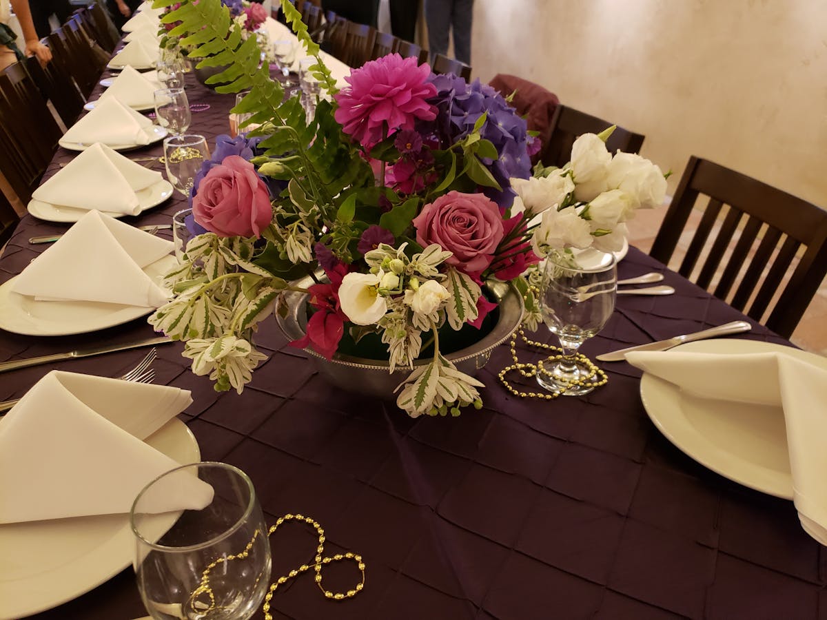 a vase of flowers on a table