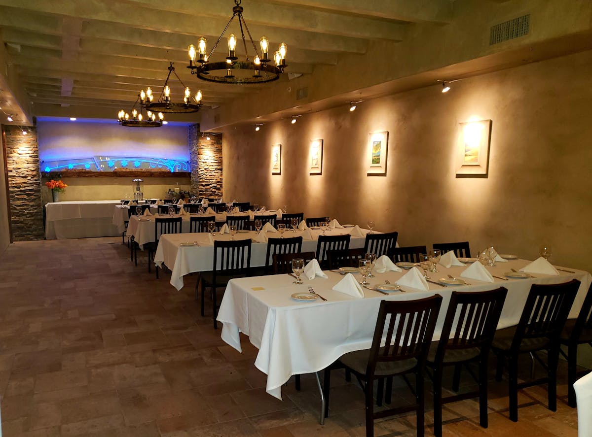 a large room with tables and chairs