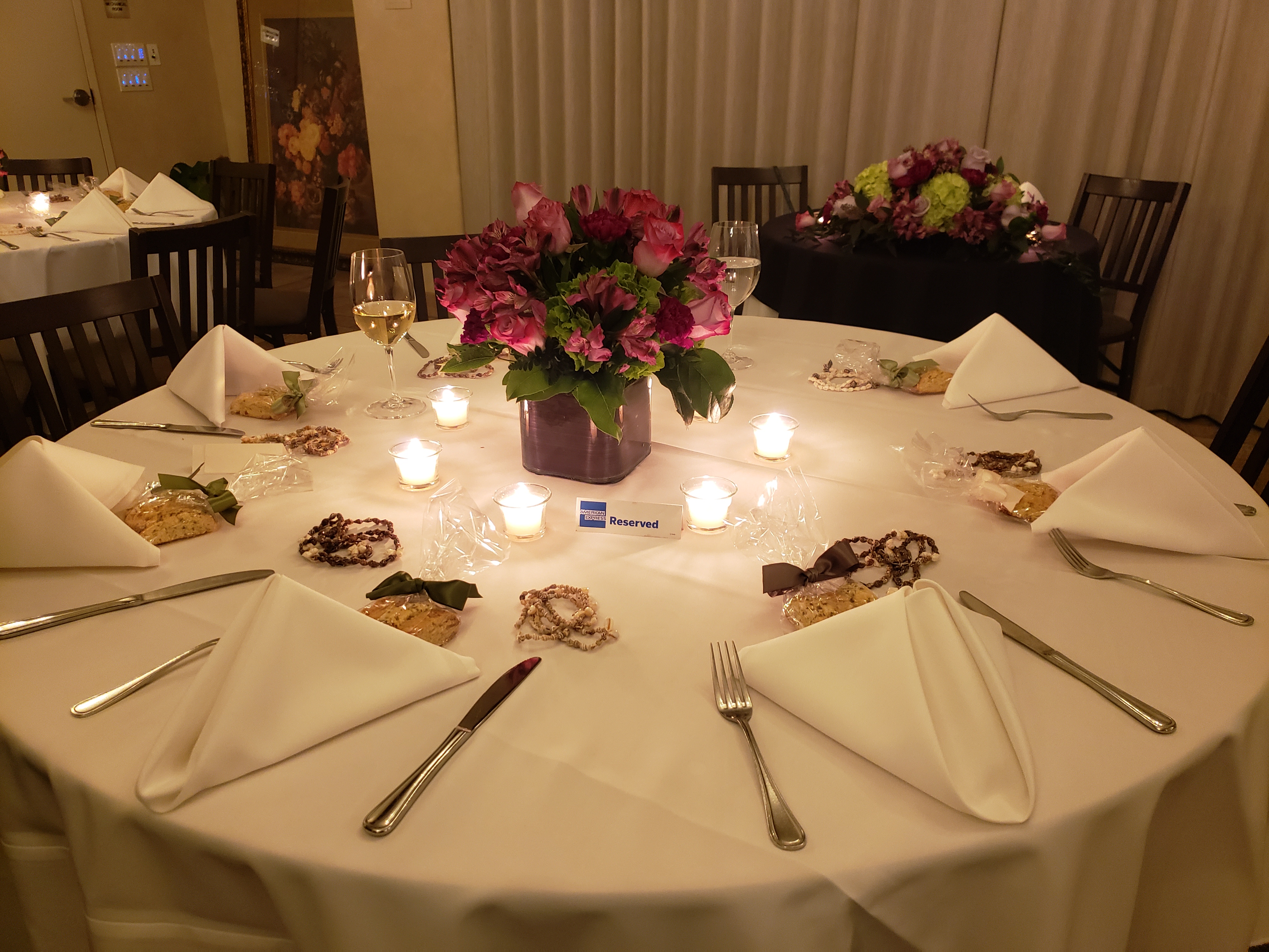 a dining room table with a cake on a plate