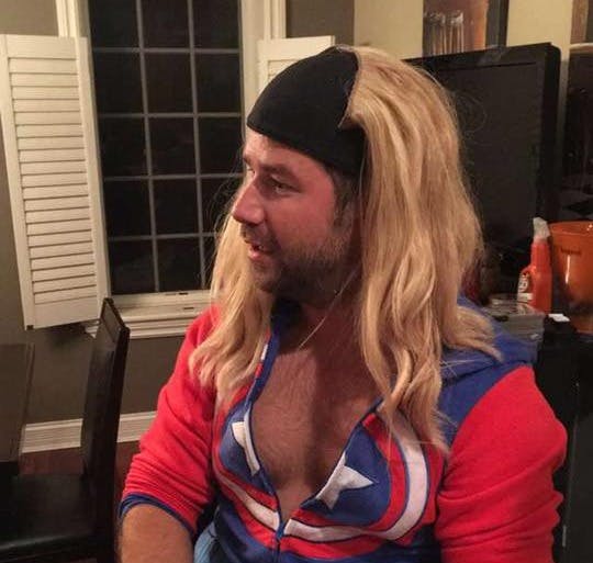 a person wearing a wig