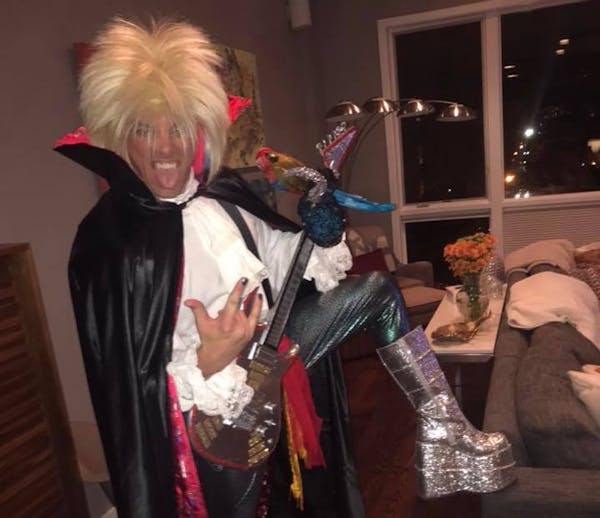 a person wearing a costume and posing for the camera