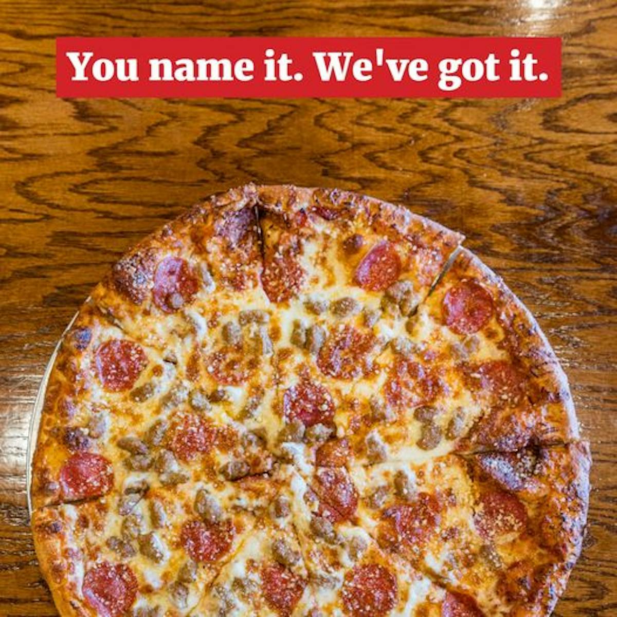 a pizza sitting on top of a table