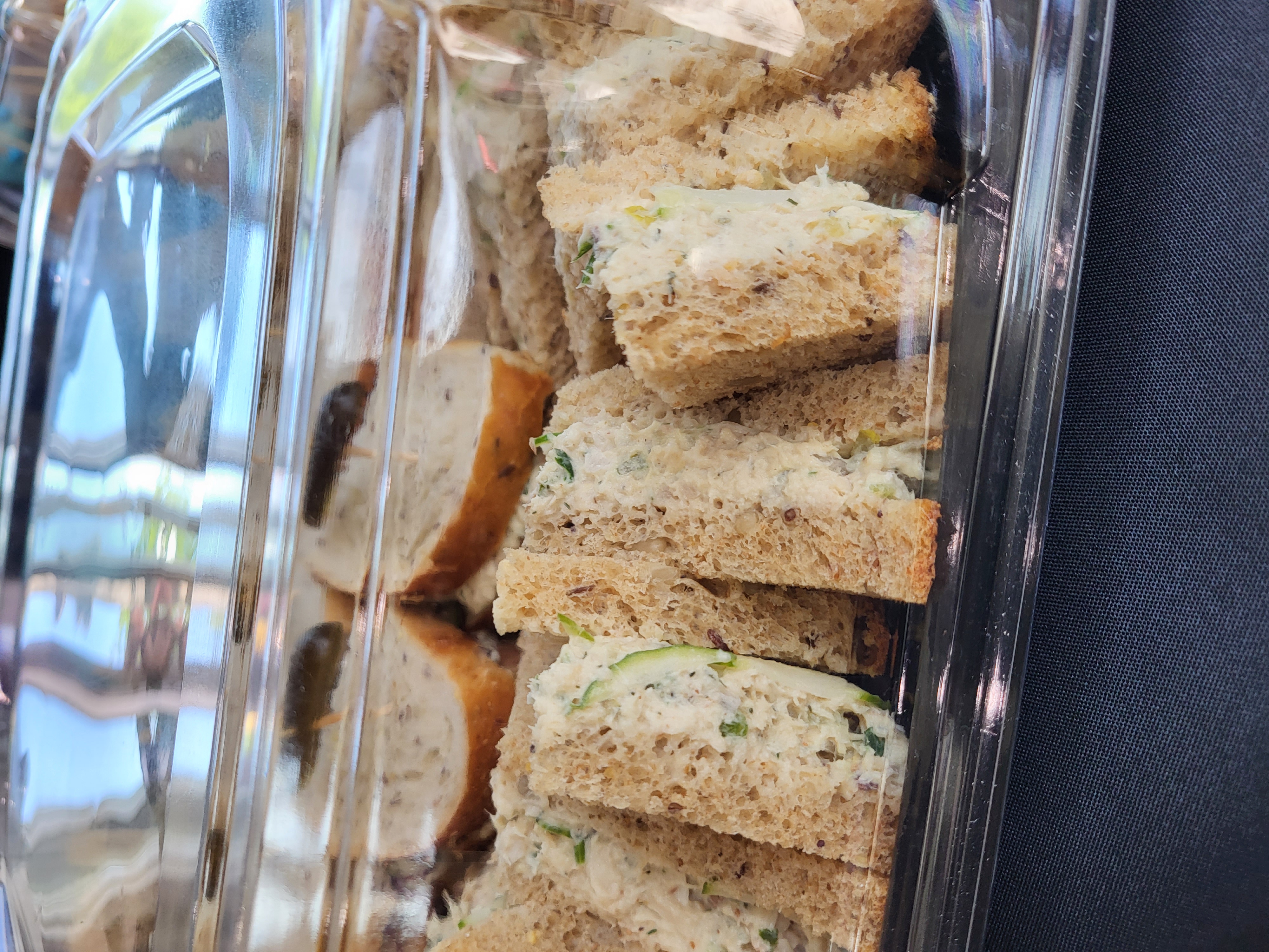a tray of food with a slice cut out of a car