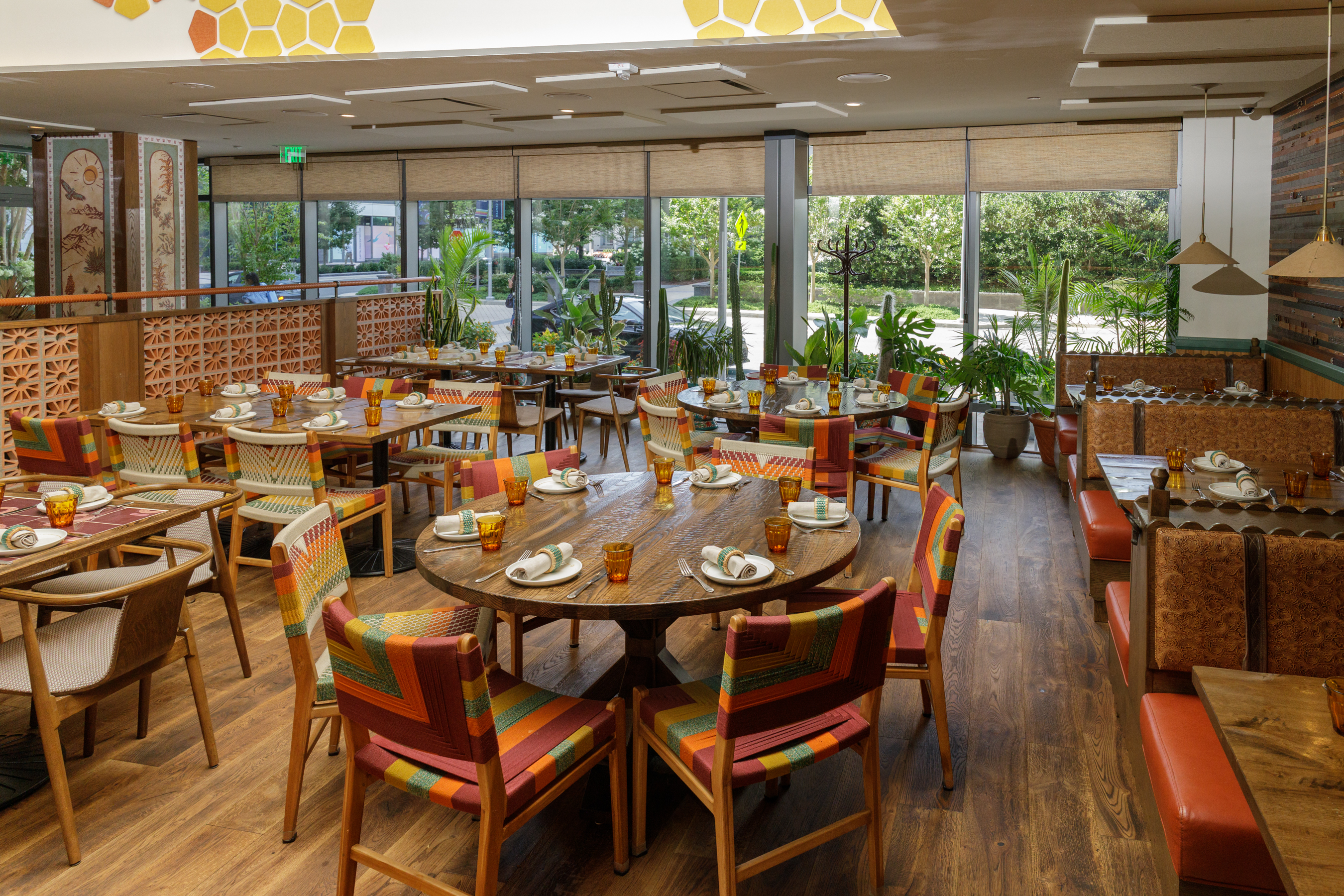a dining room table in front of a window