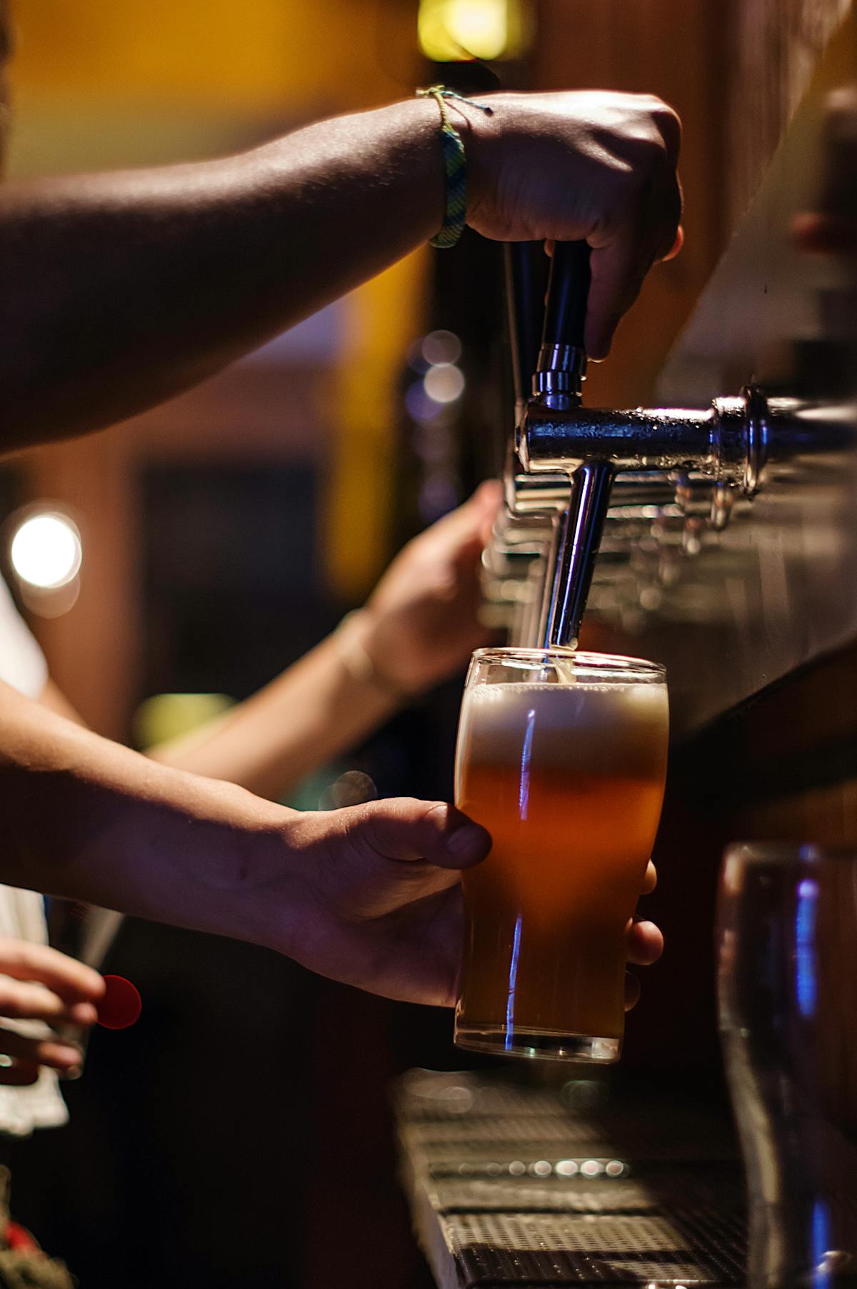 pouring beer from the tap (818) 8one8