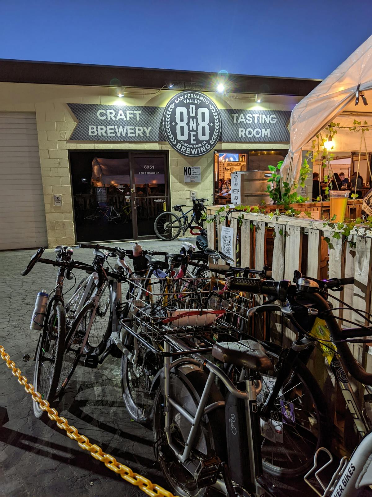 a bicycle parked on the side of a building