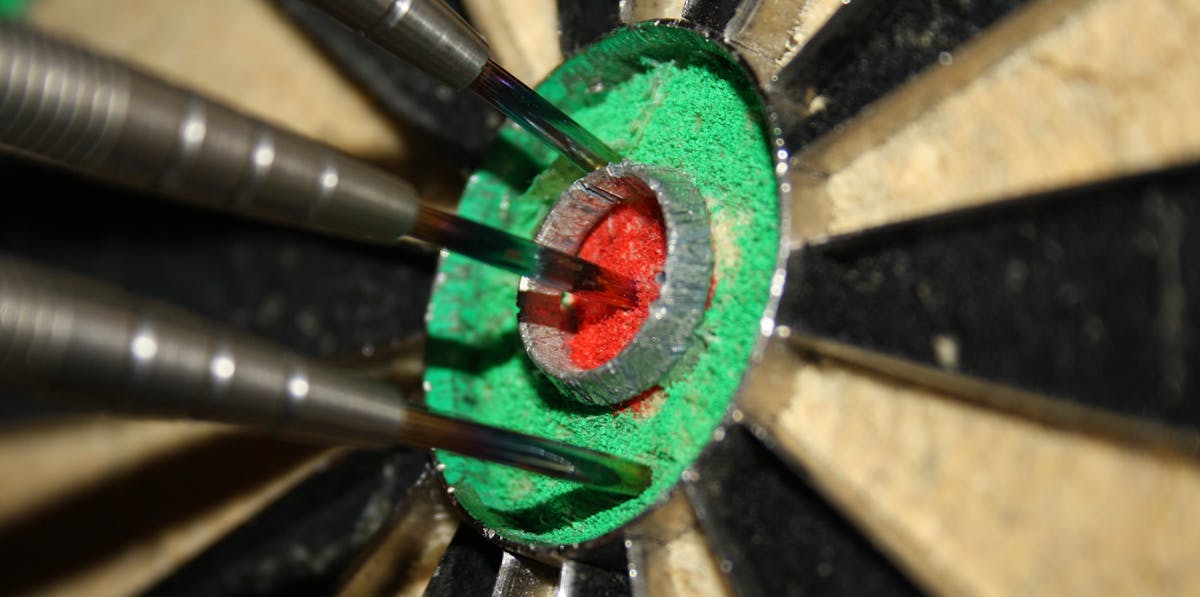 a close up of the center of a dart board