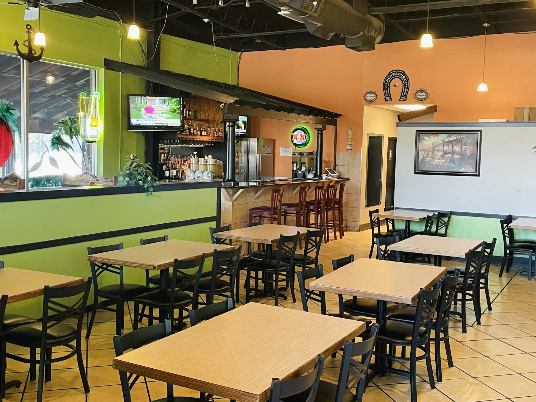 a room filled with furniture and a table in a restaurant