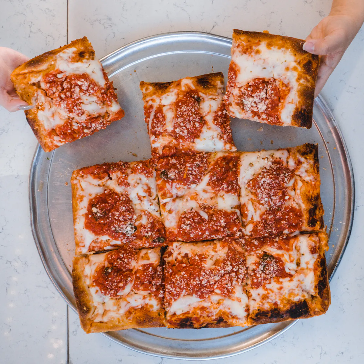 a slice of pizza on a plate