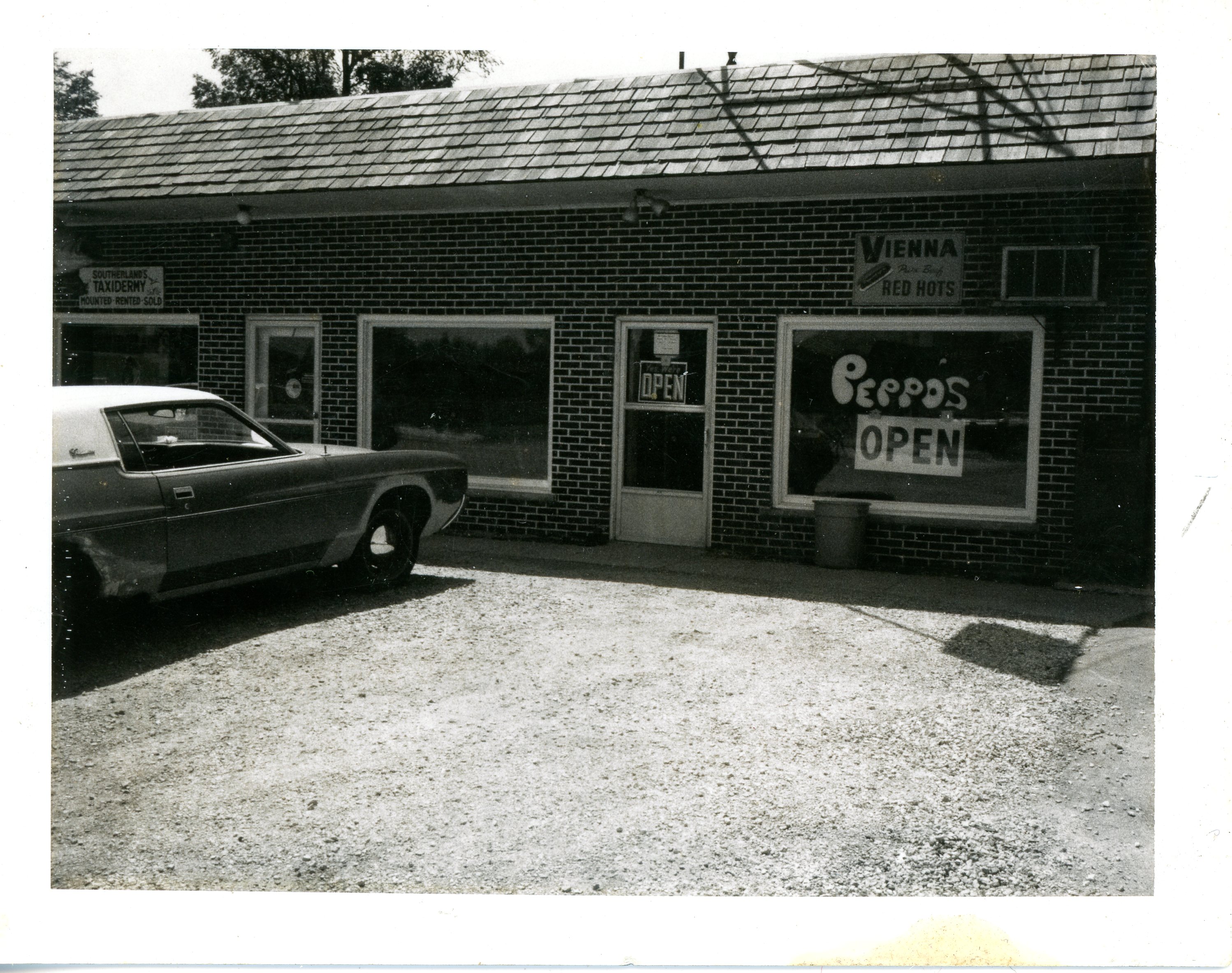 a car parked in front of a building