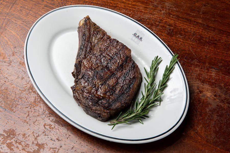 Four 2022 Ounce Rib Chop Dry Age Oak Steakhouse A Modern Take On The Classic American