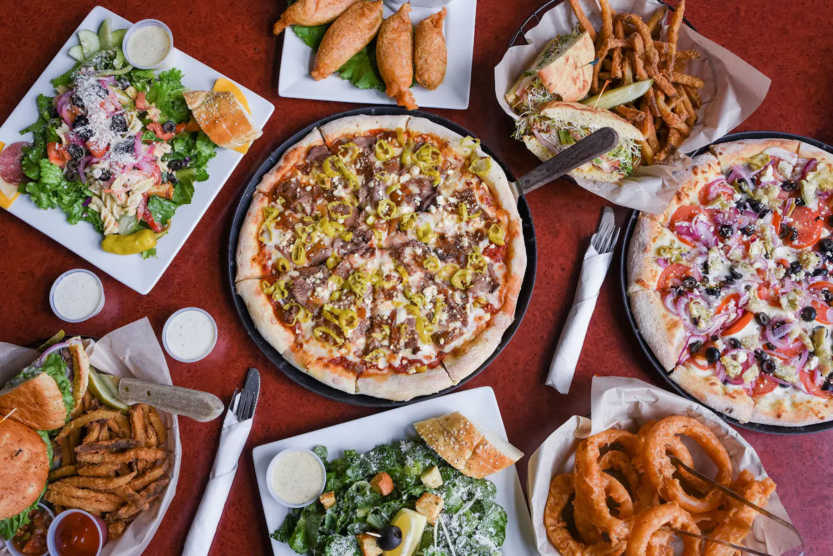 a bunch of different types of food on a table