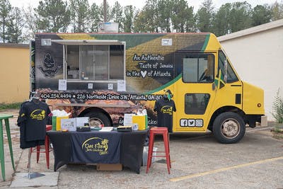 a group of people are cooking in it