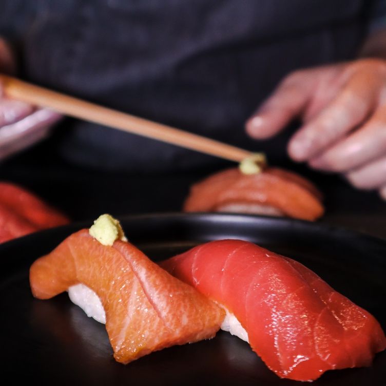 Sushi chef preparing omakase courses at the 9-seat Sushi Bar during weekday business lunch service at Ro Hyde Park
