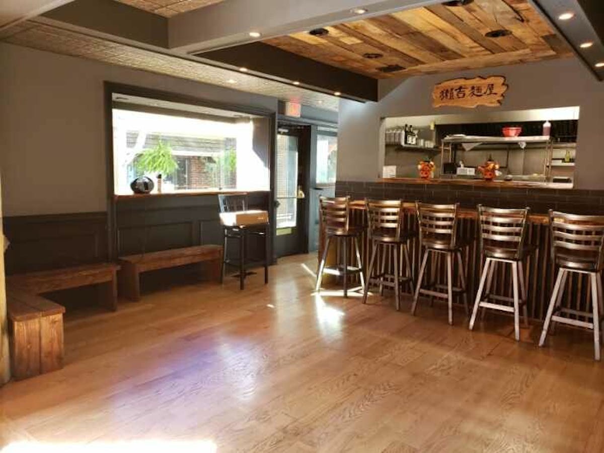 a room filled with furniture and a wood floor