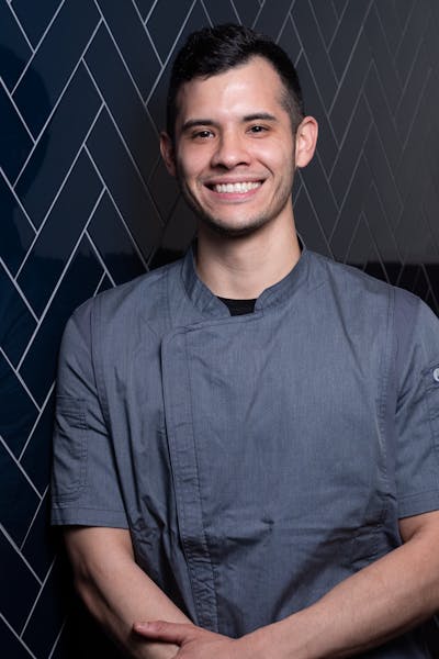 a man smiling for the camera