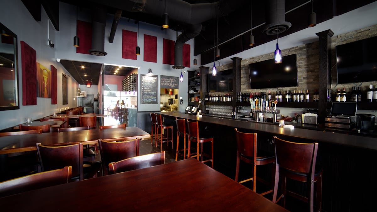 a dining room table in a restaurant kitchen