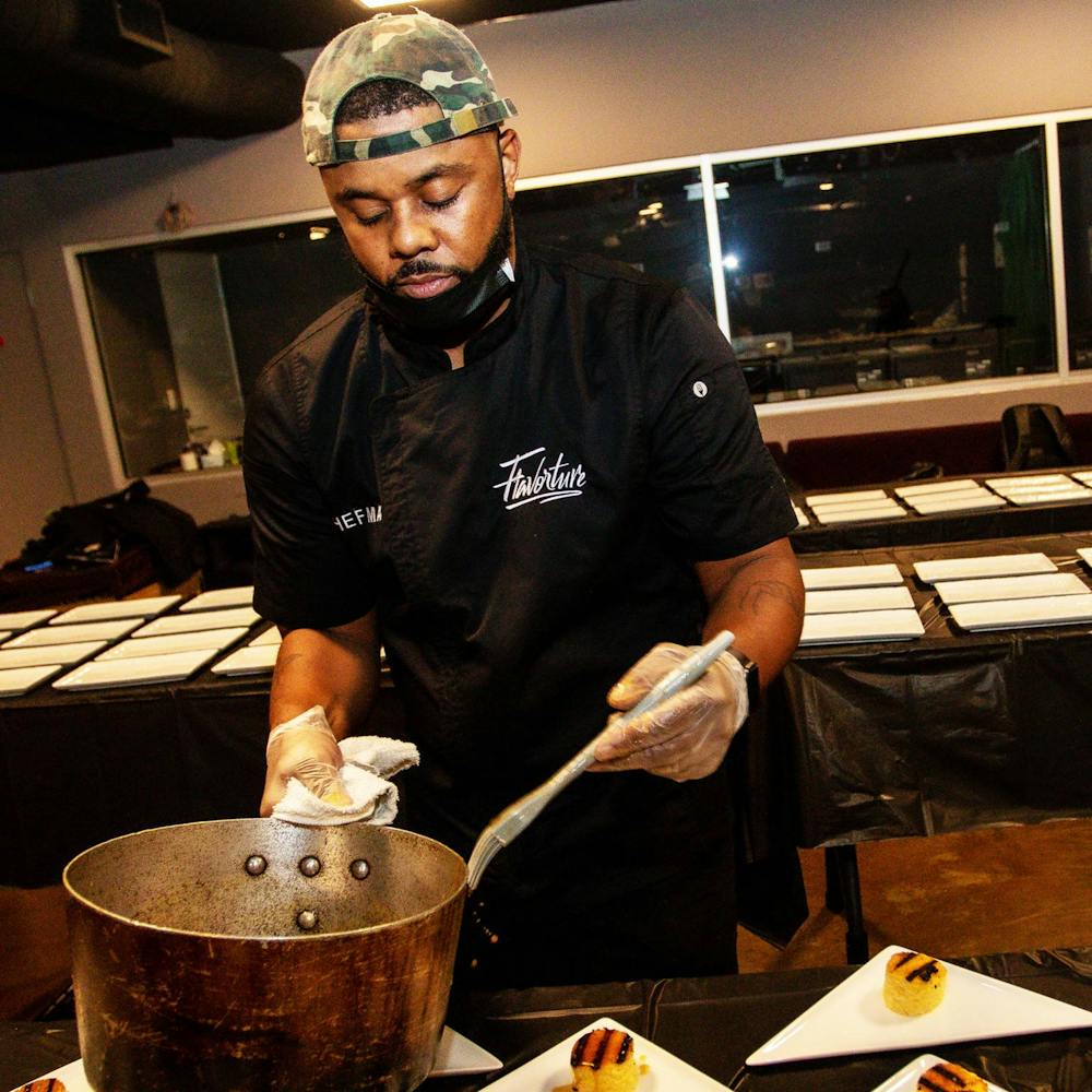 a man that is cooking some food