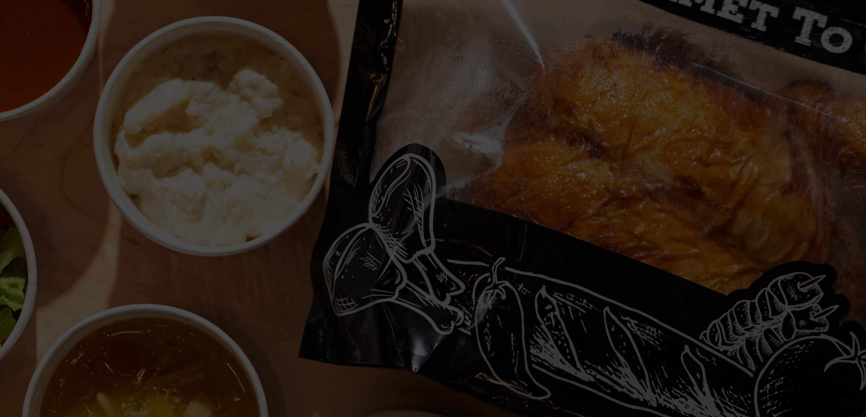 a plate of food and a cup of coffee