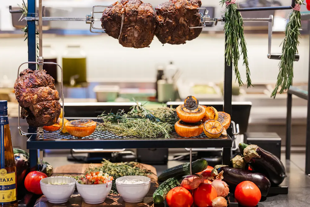 meat on a rack with vegetables