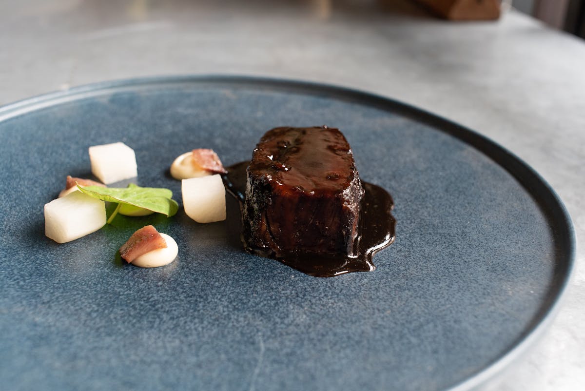 a piece of chocolate cake on a plate