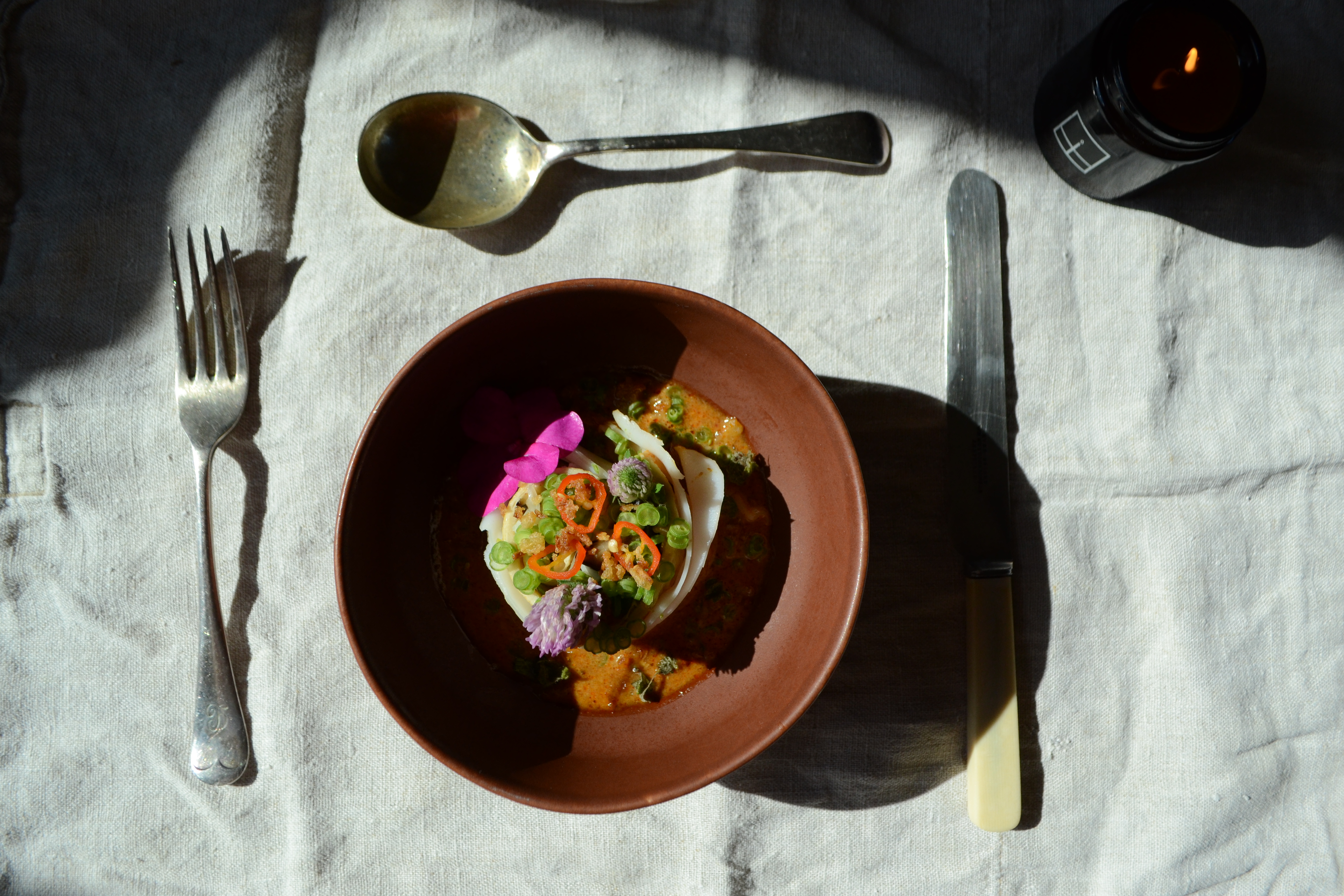 a plate of food with a fork and knife