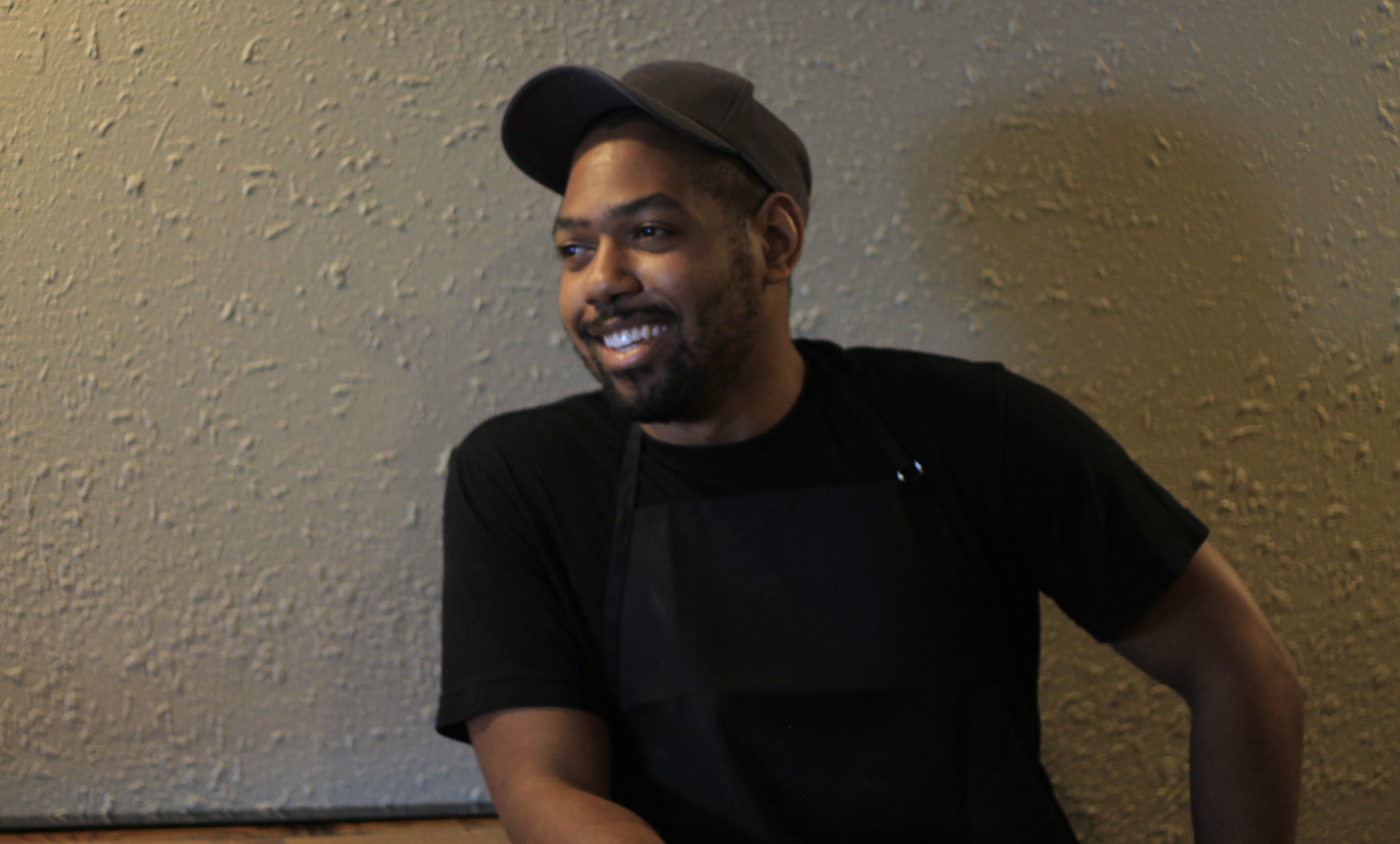a man standing in front of a building