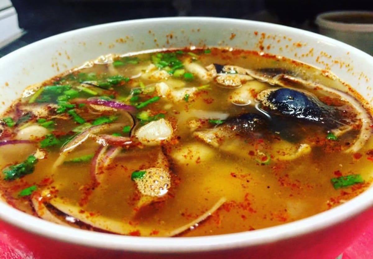 a close up of a bowl of soup
